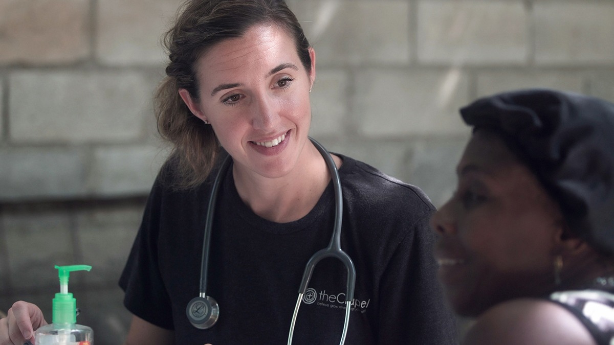 Nurse helping patient at a clinic.<br />
Photo by <a href="https://unsplash.com/@zvessels55?utm_content=creditCopyText&utm_medium=referral&utm_source=unsplash">TopSphere Media</a> on <a href="https://unsplash.com/photos/woman-in-black-crew-neck-shirt-wearing-blue-earbuds-WxRd7byFxs4?utm_content=creditCopyText&utm_medium=referral&utm_source=unsplash">Unsplash</a><br />
  